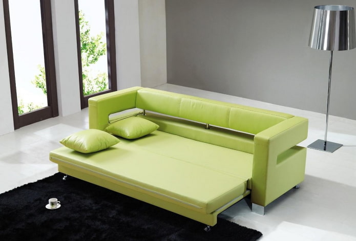 выкатной диван зеленого цвета в интерьере
