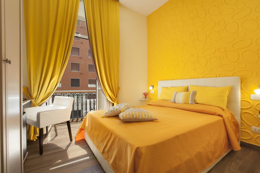 Отделка интерьера спальни в желтом цвете