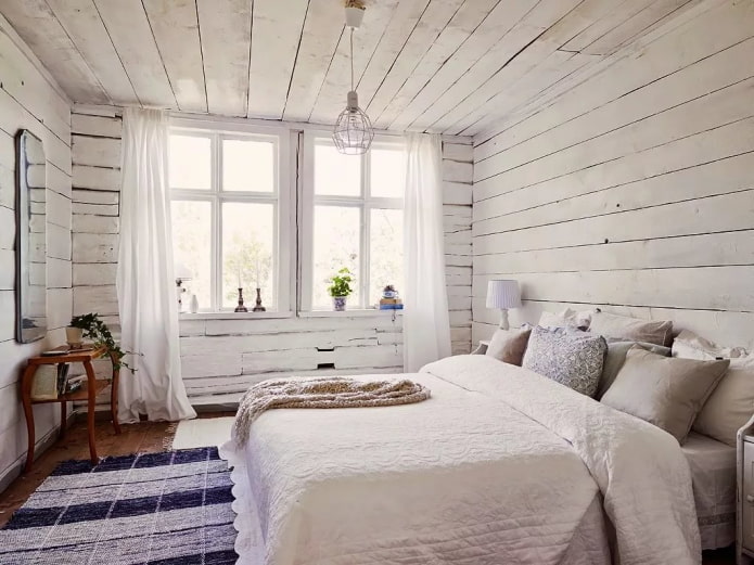 скандинавская спальня в интерьере деревянного дома