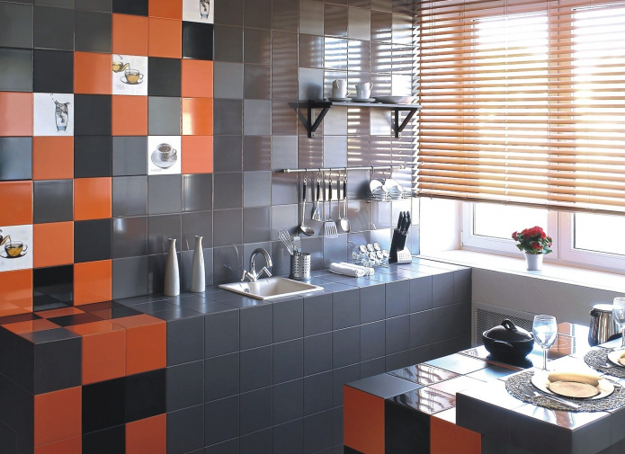 черный, белый, серый и оранжевый цвет в отделке кухни