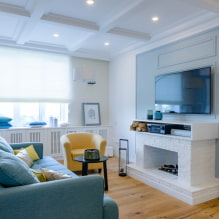 Гостиная с камином и телевизором: виды, варианты расположения на стене, идеи для квартиры и дома-8